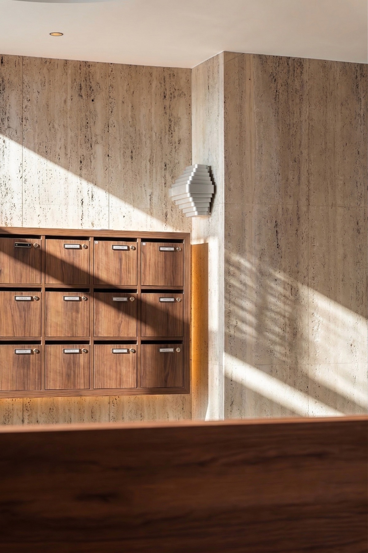 Travertine and walnut interior